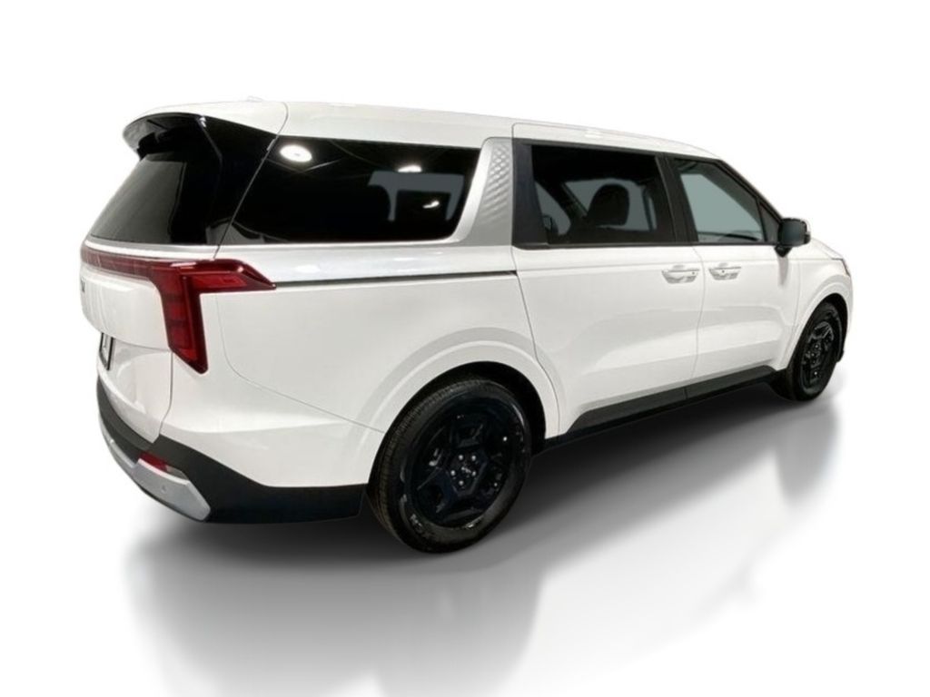 2026 Kia Carnival LXS - Snow White Pearl exterior view 7