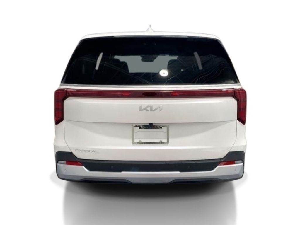 2026 Kia Carnival LXS - Snow White Pearl exterior view 6