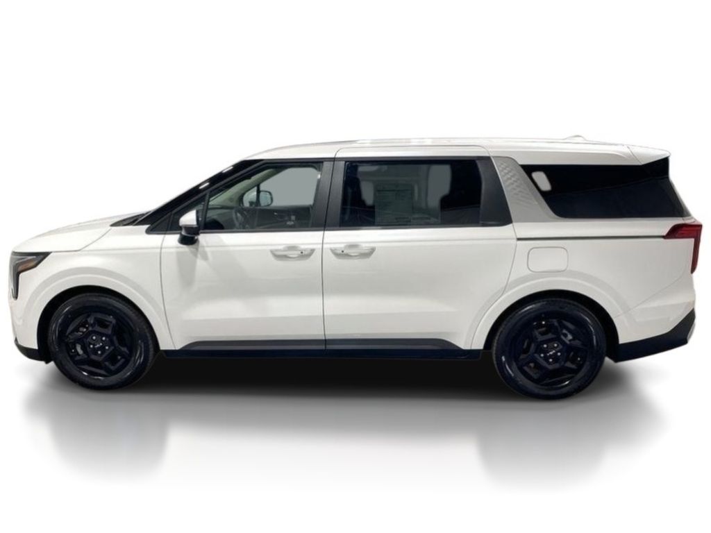 2026 Kia Carnival LXS - Snow White Pearl exterior view 4