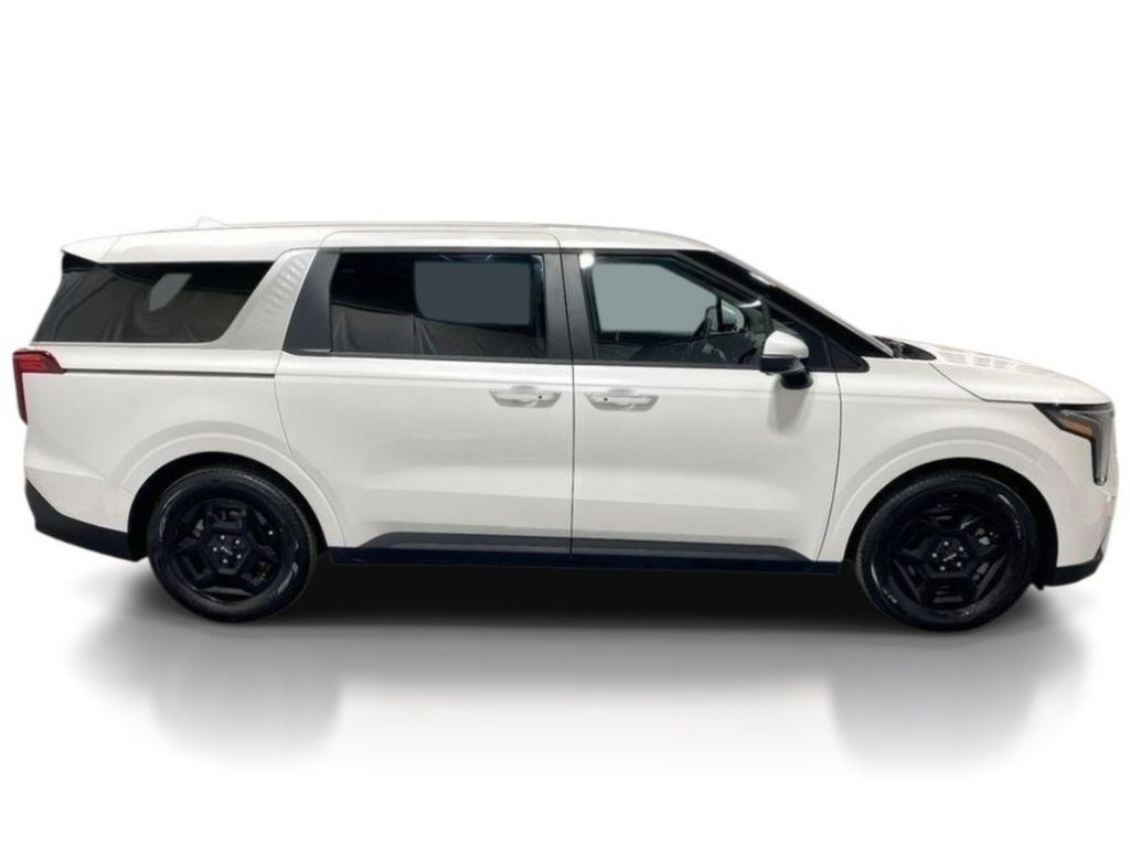 2026 Kia Carnival LXS - Snow White Pearl exterior view 8