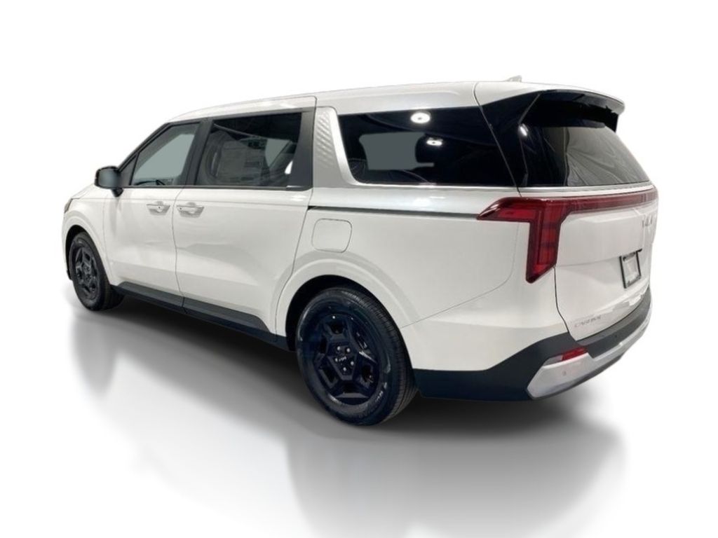 2026 Kia Carnival LXS - Snow White Pearl exterior view 5