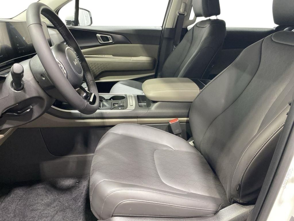 2026 Kia Carnival LXS - Snow White Pearl exterior view 12