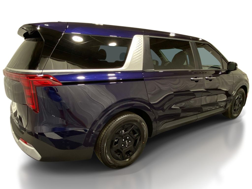 2026 Kia Carnival LXS - Deep Chroma Blue exterior view 4
