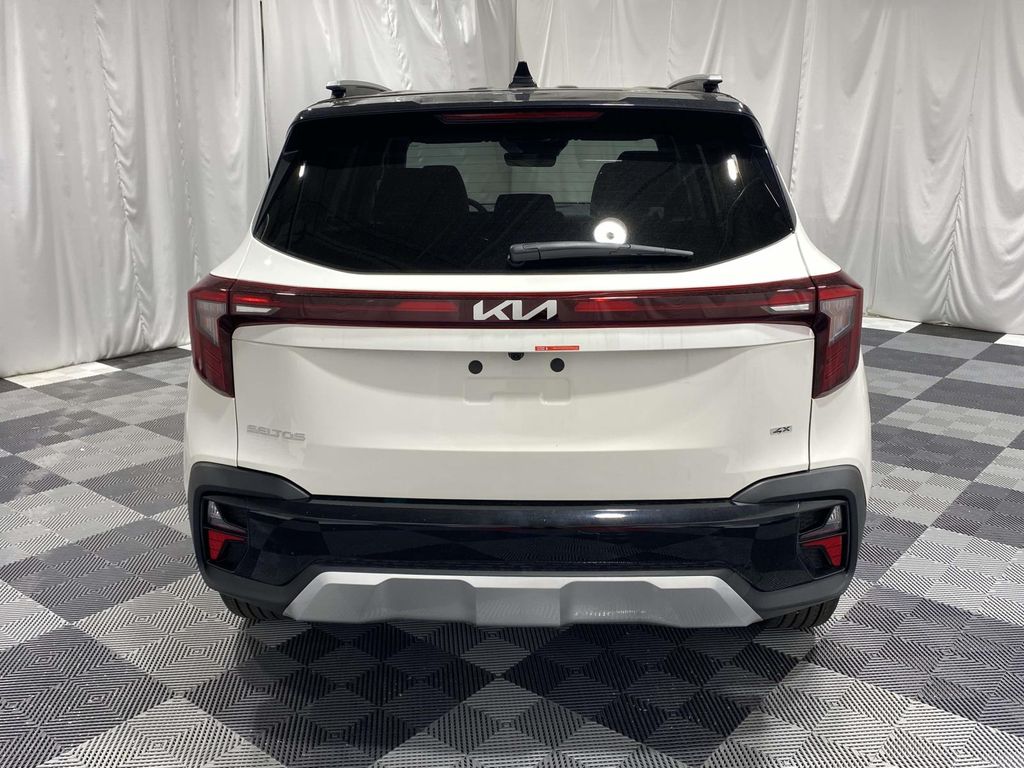 2026 Kia Seltos S - Clear White/Black Roof exterior view 3