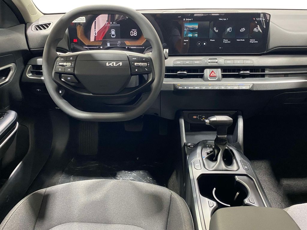 2026 Kia K4 LXS - CURRANT RED exterior view 11