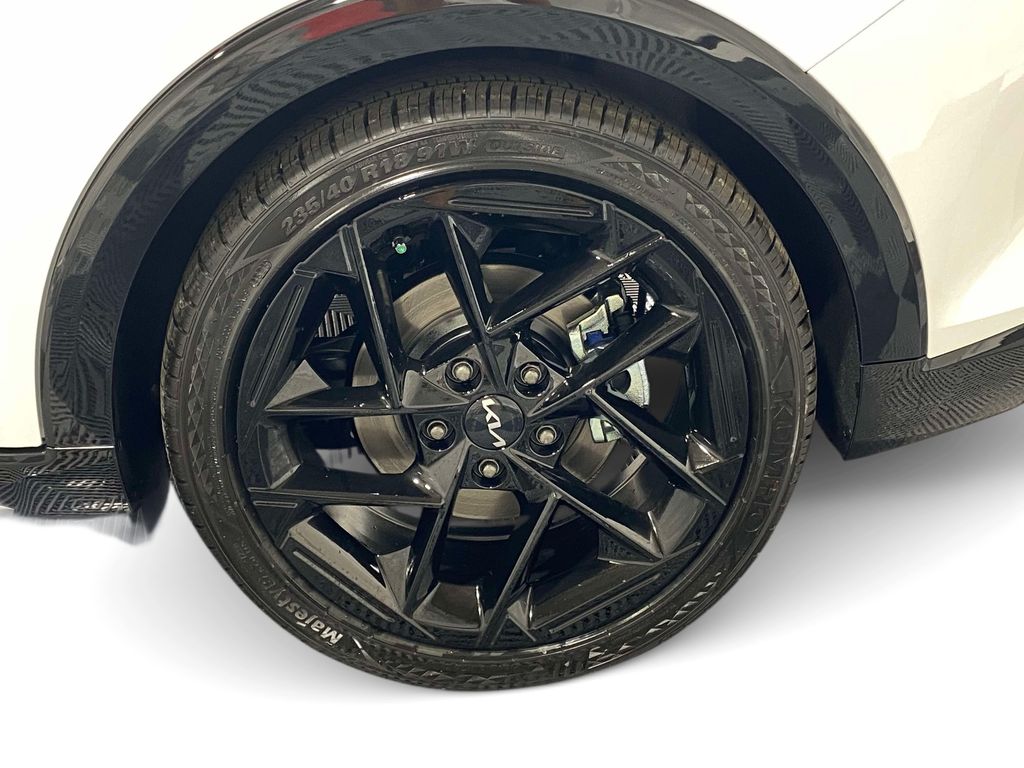 2026 Kia K4 GT-Line Turbo - Snow White Pearl exterior view 7