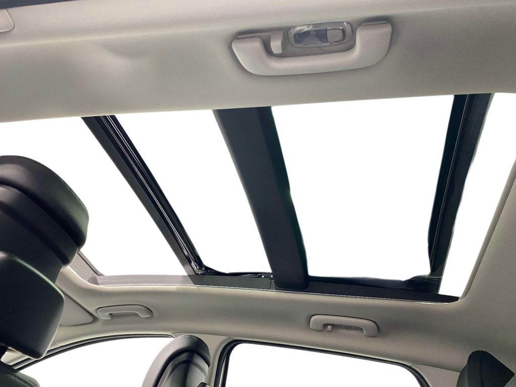 2026 Kia Sportage Hybrid EX - Snow White Pearl exterior view 16