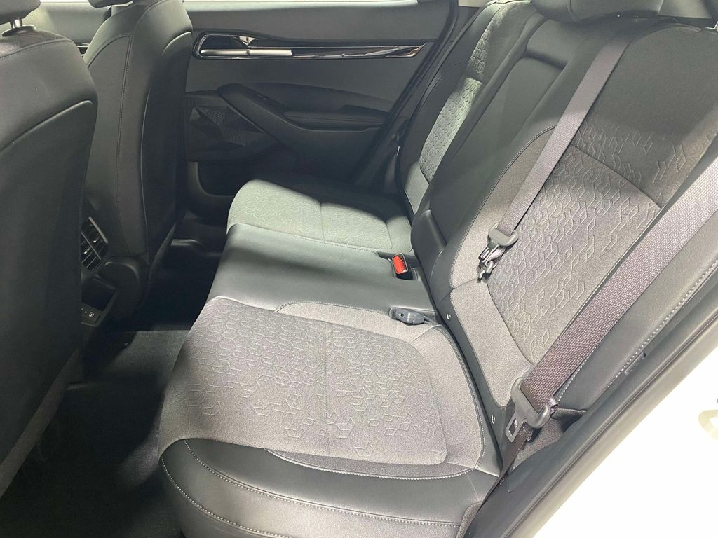 2026 Kia Seltos S - Clear White/Black Roof exterior view 11