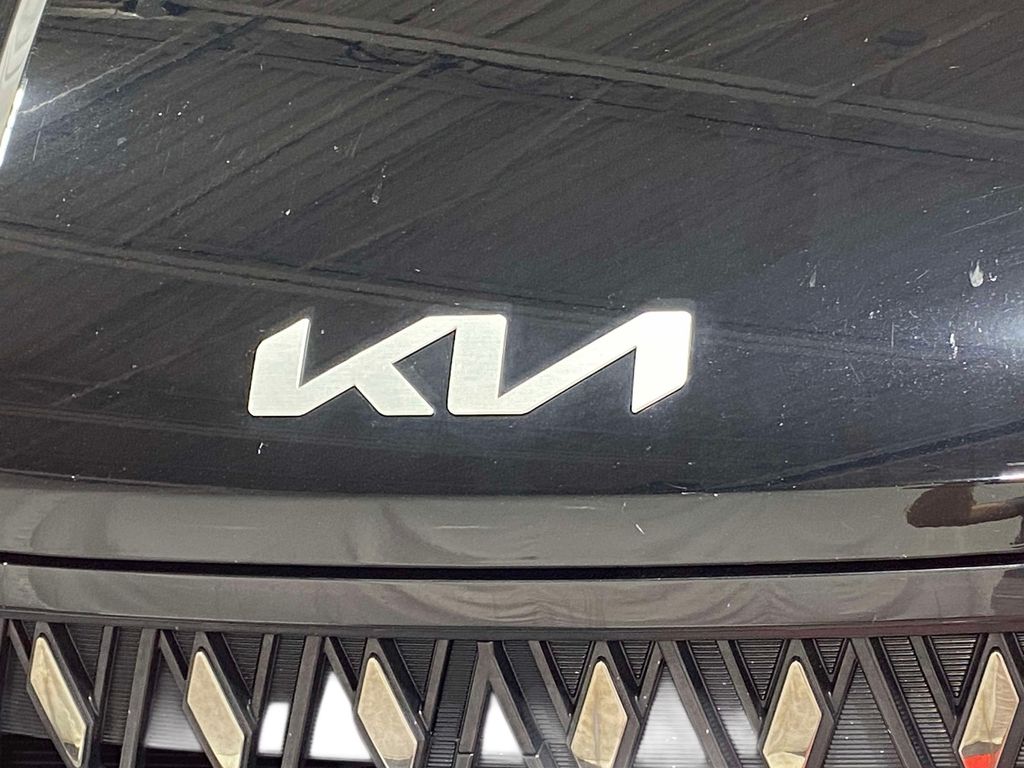2025 Kia Carnival Hybrid EX - Aurora Black Pearl exterior view 8