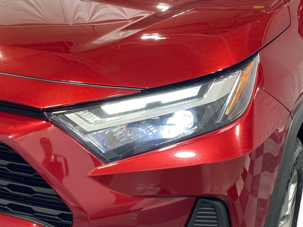 2023 Toyota RAV4 XLE - Ruby Flare Pearl exterior view 7